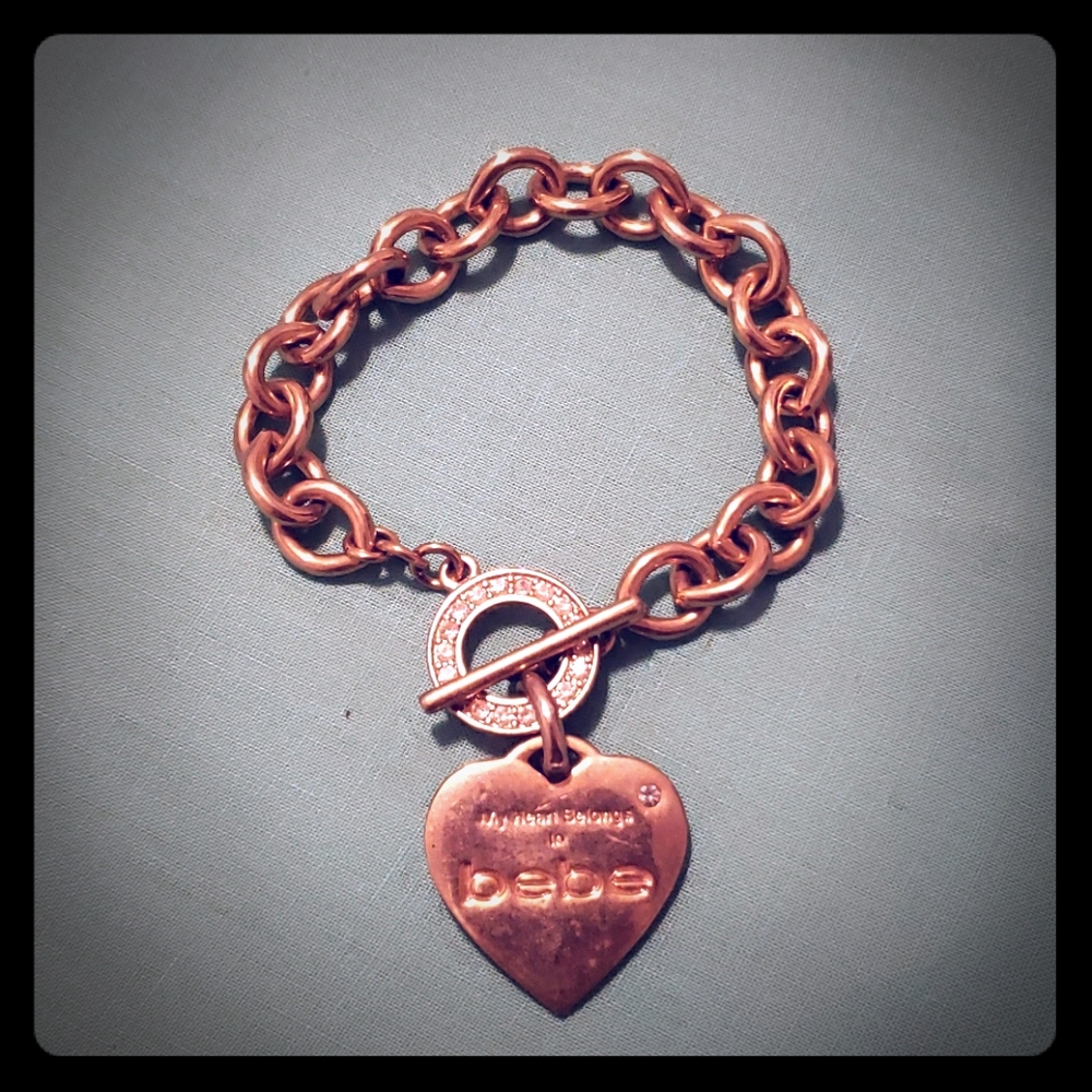 Bebe gold colored bracelet with rhinestones